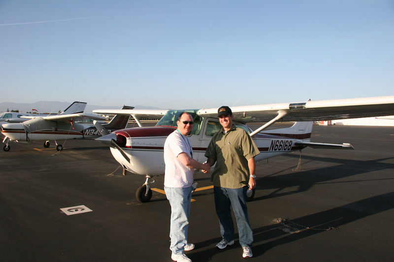 Antonio (Venturamd) > Private Pilot Awarded May 5th, 2007!!!! Picture of me and my flight instructor Reid Santiago in front of the plane I trained in, a Cessna 172P N66168.
